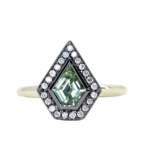 0.70ct Shield Cut Montana Sapphire and Blackened Gold Bezel Set Diamond Halo In 14k Green Gold